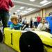 Ann Arbor resident Daniel Pritts, 4, plays in a race car game cockpit during the Mini Maker Faire on Saturday, June 8. Daniel Brenner I AnnArbor.com